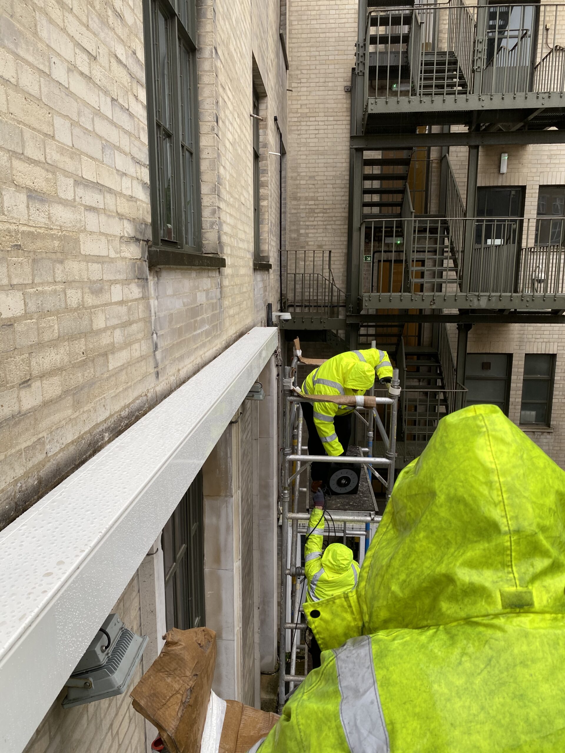 Team Shade-Space Installing A Commercial Awning on a Site - Shade-Space