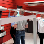Shade Space Team Demonstrating the Installation of Retractable Pergola - Shade-Space